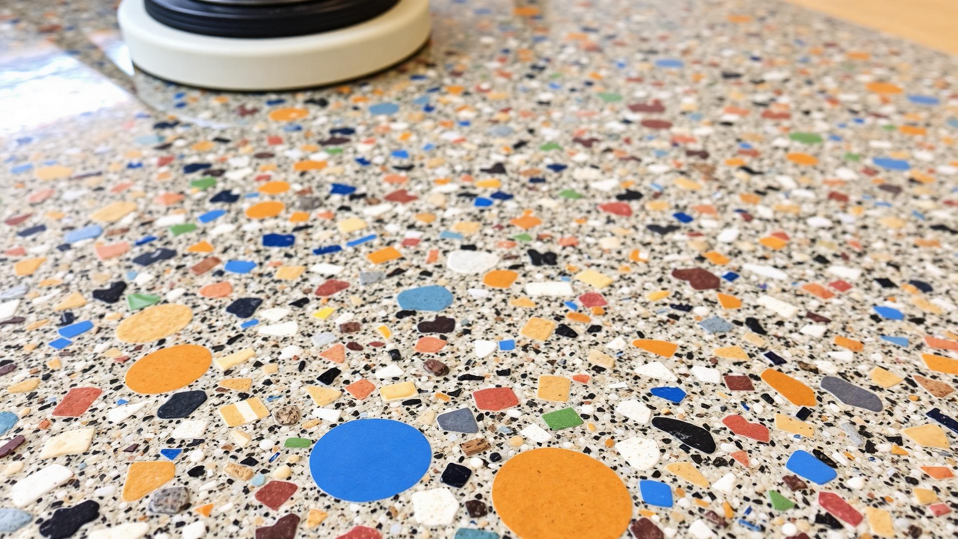 Colorful terrazzo flooring being polished